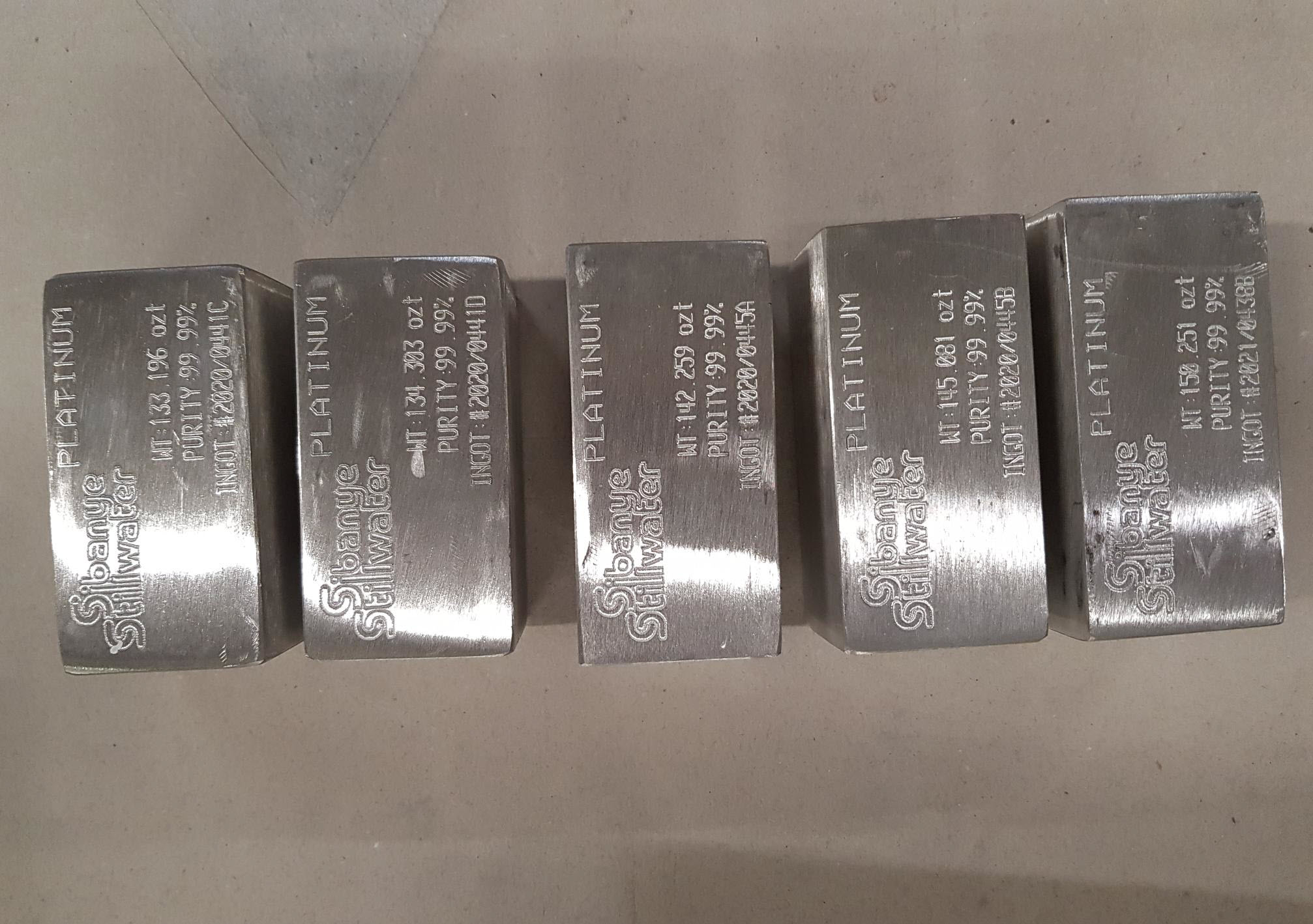 5 platinum wholesale bars within a vault