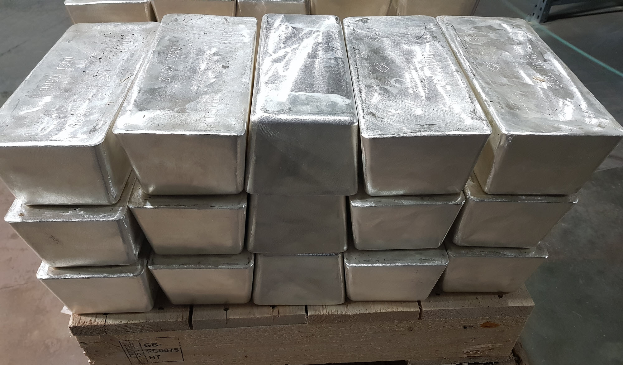 15 silver bars 1000oz each on a pallet in a vault